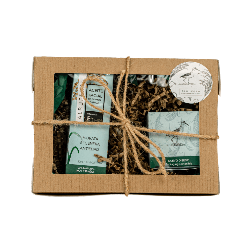 pack aceite de germen de arroz y crema facial de germen de arroz en una caja con un lazo